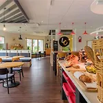 Ibis Strasbourg Aeroport Le Zenith מלון